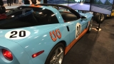 Una postazione di guida con un'auto vera e Assetto Corsa